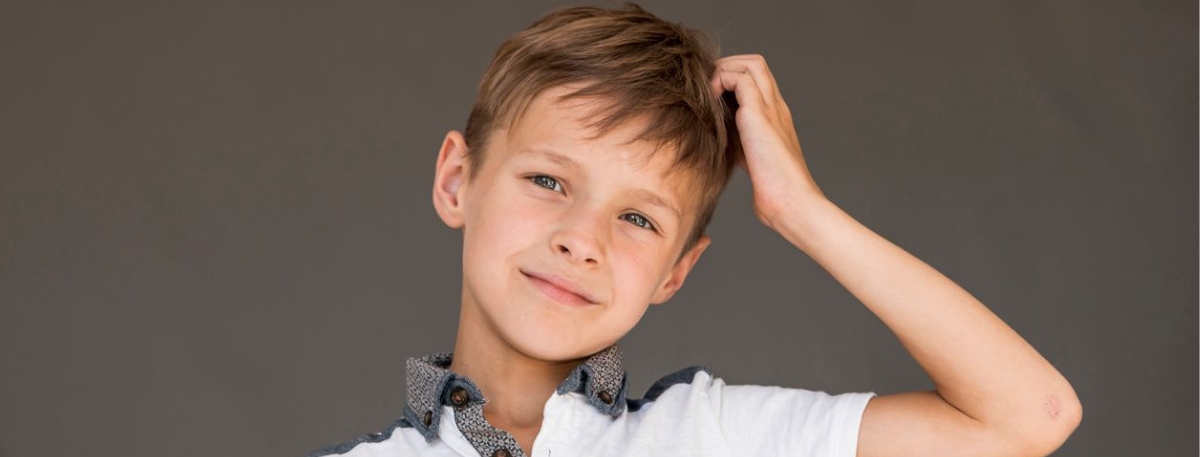 Child representing the emotional and daily life impact of alopecia in children beyond hair loss, particularly for families in Miami.