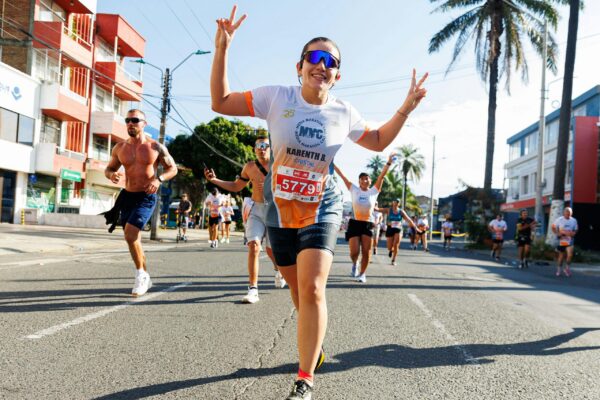 Energetic runners participating in a city marathon, showcasing enthusiasm and sportsmanship.