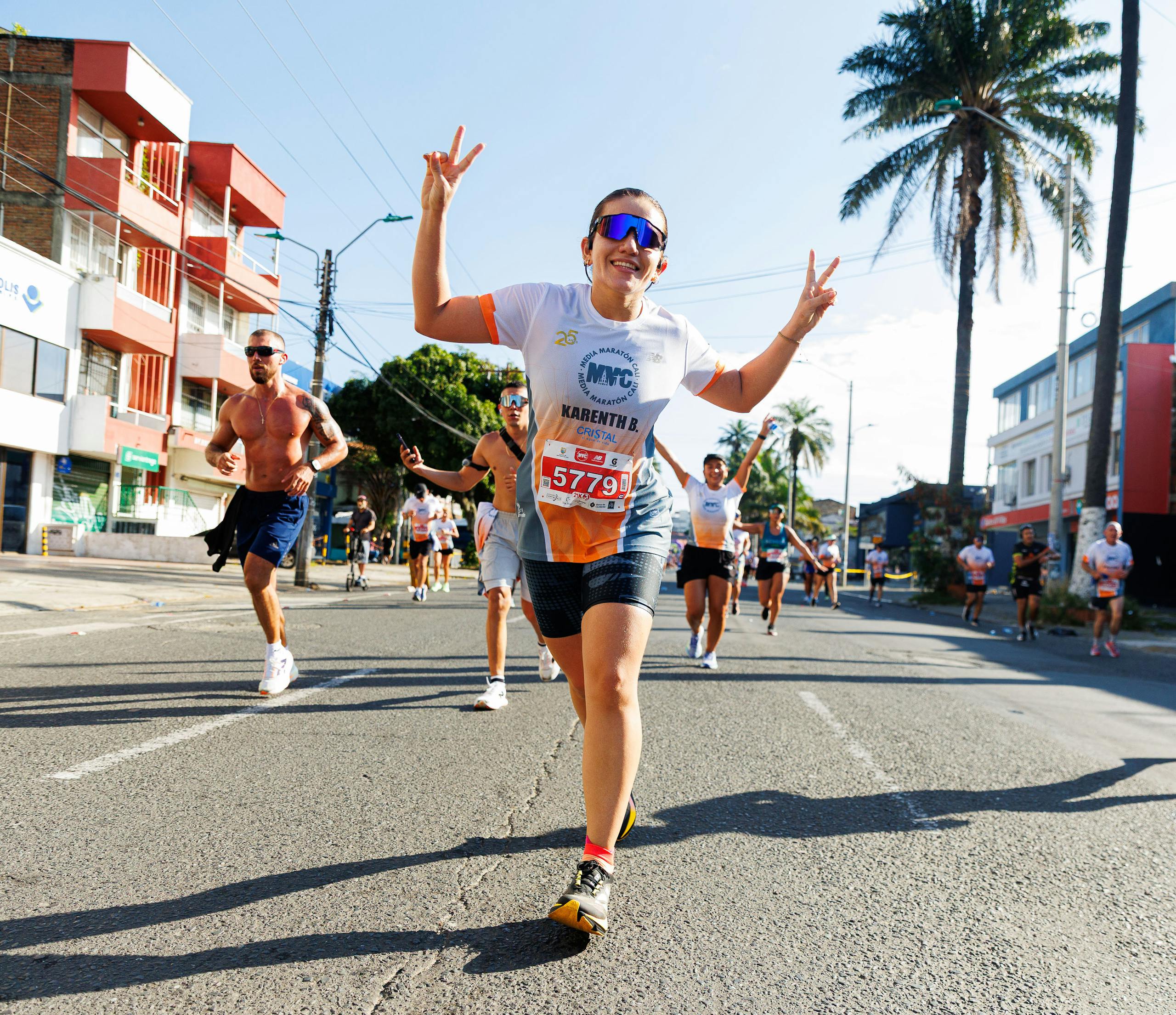 Energetic runners participating in a city marathon, showcasing enthusiasm and sportsmanship.
